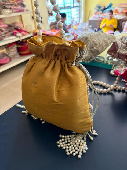 DP107 - Moti Hand Work Potli – Luxury Handcrafted Elegance