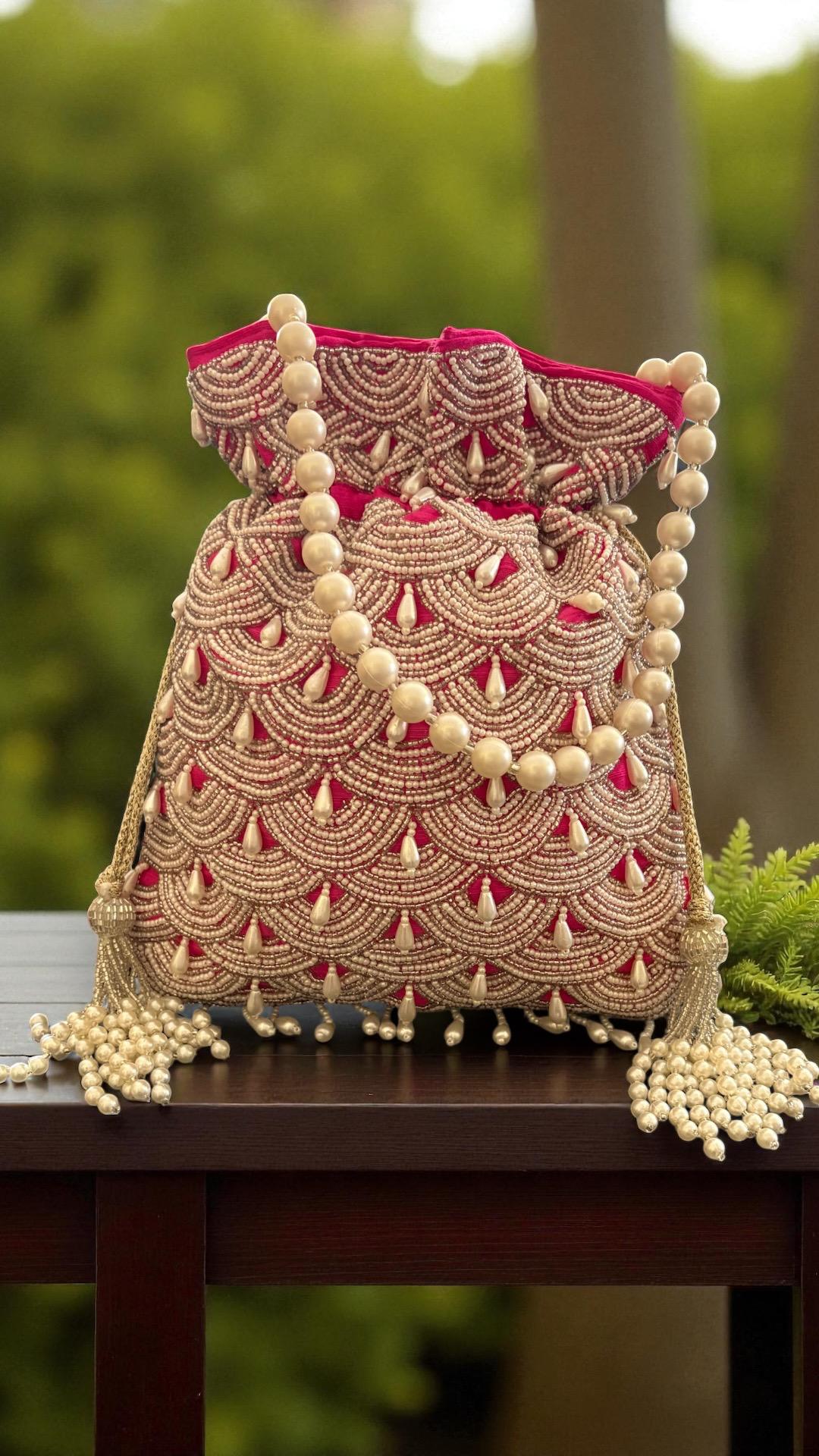 DP107 - Moti Hand Work Potli – Luxury Handcrafted Elegance