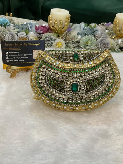 C. Emerald Green Designer Metal Clutch