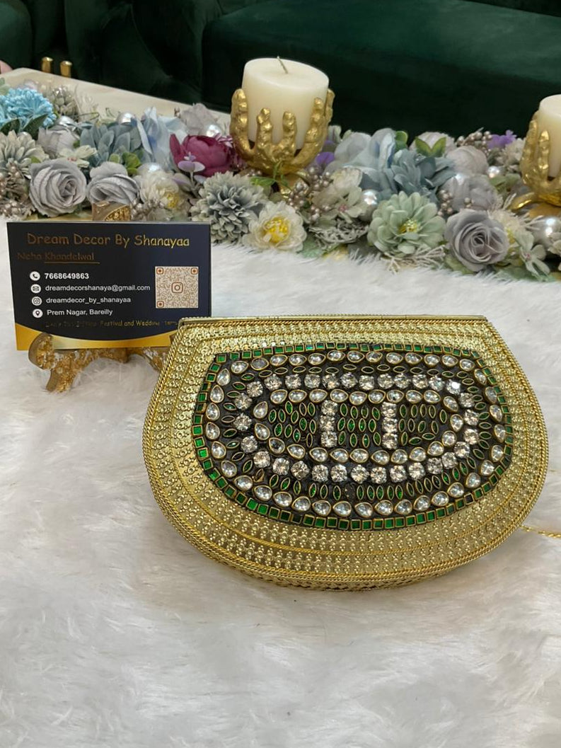C. Emerald Green Designer Metal Clutch