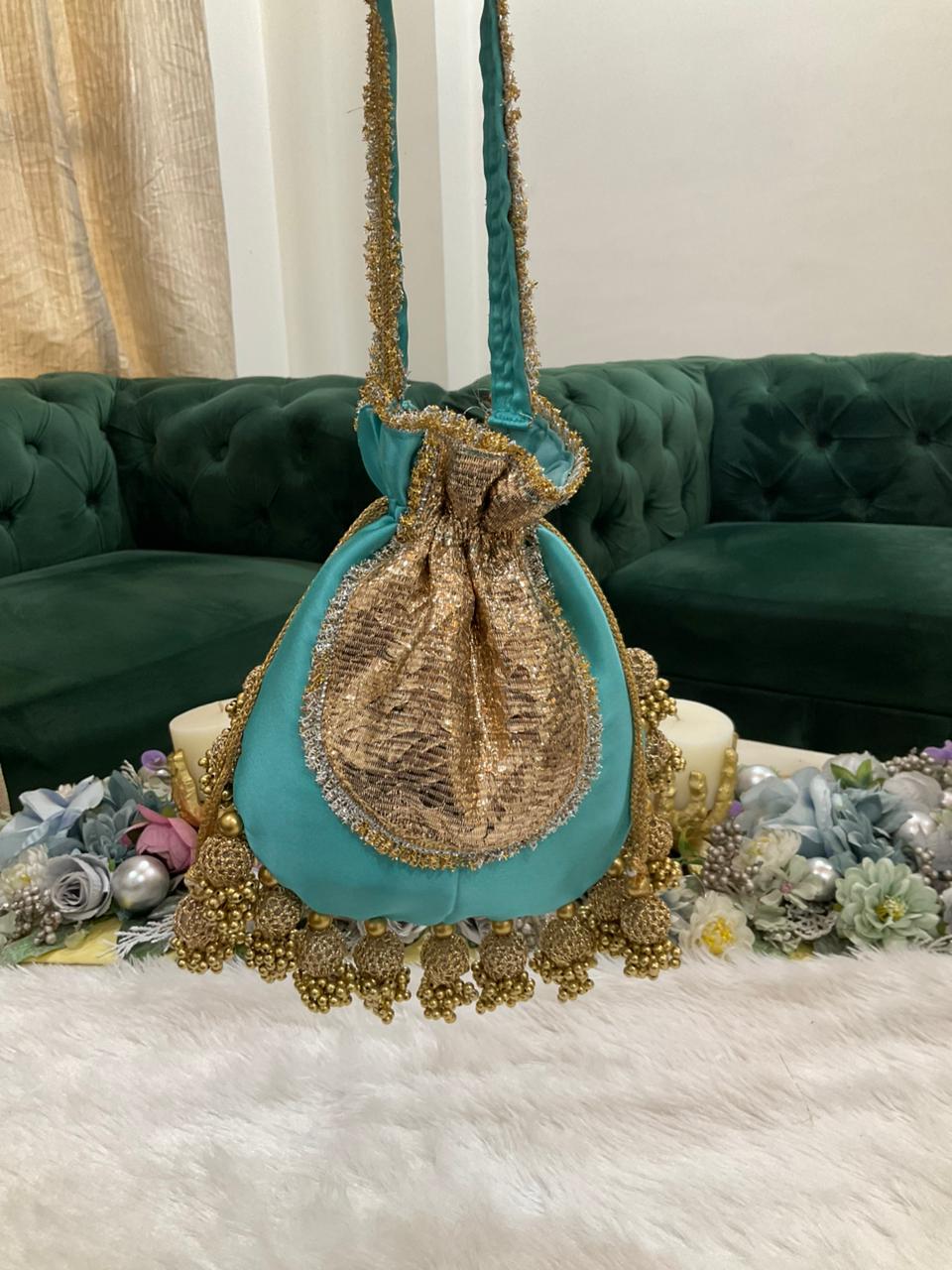 DP121 -  Satin JHUMKA Potli with Gota Patch – 10 x 9 inches