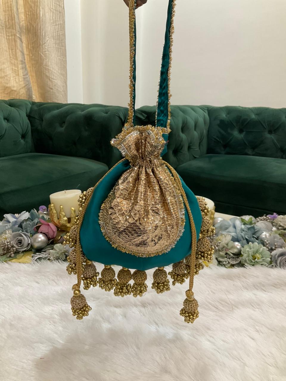 DP121 -  Satin JHUMKA Potli with Gota Patch – 10 x 9 inches