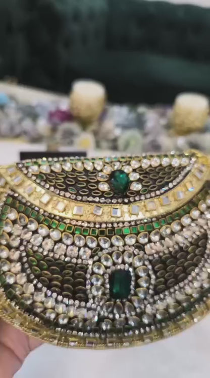 C. Emerald Green Designer Metal Clutch